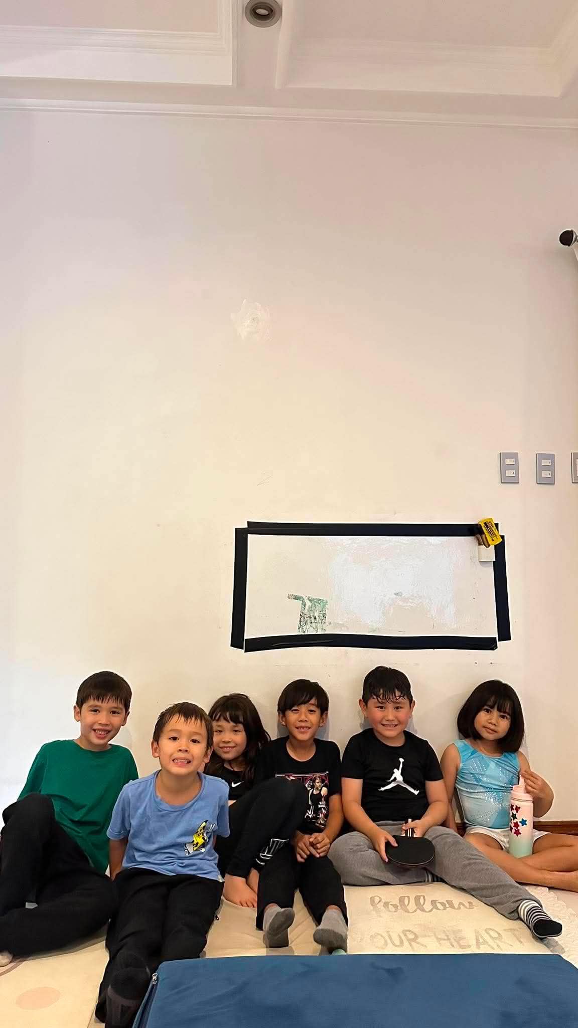 Kids sitting together at Coach Von's Little Tumblers